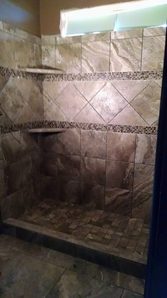 Custom shower tile and mosaic detail by Parsons Stone and Tile